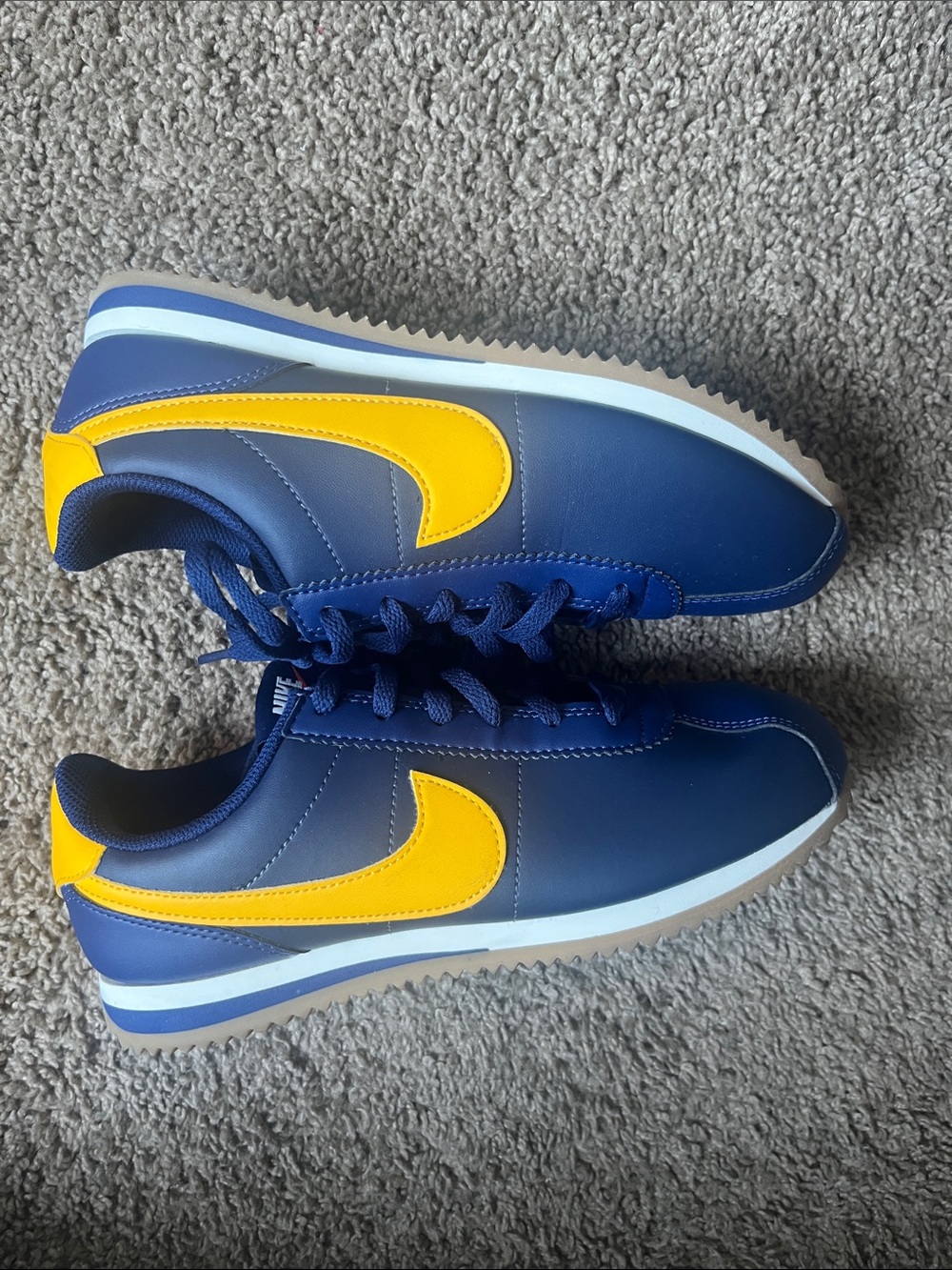 Nike Kids Navy Sneakers with Bright Yellow Swoosh Cortez